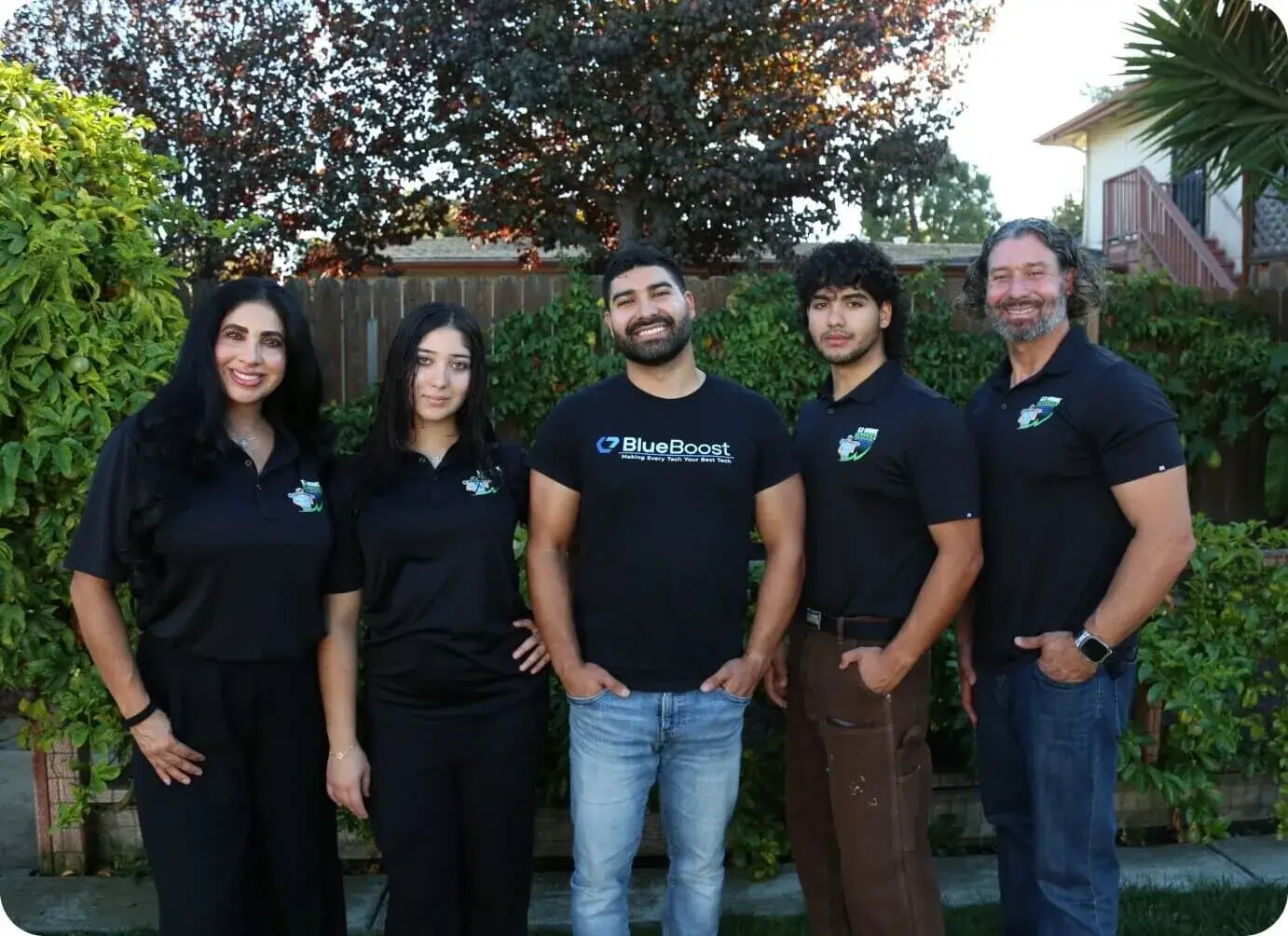 The Jimenez family in BlueBoost shirts in their backyard today